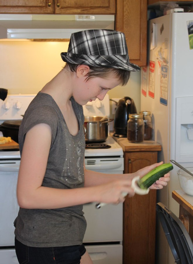 Peeling the cucumbers